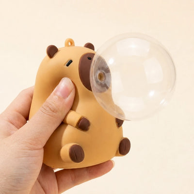 握ると口から大きな泡がふくらむ