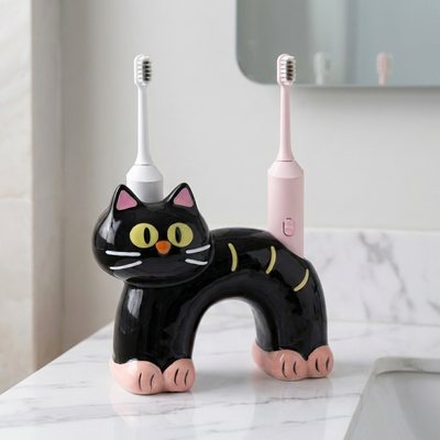 ブラックねこの歯ブラシスタンド（頭とおしりに電動歯ブラシ）