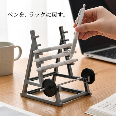 ペンをラックに戻す 使い方 デスクで手でペンを横掛けする様子