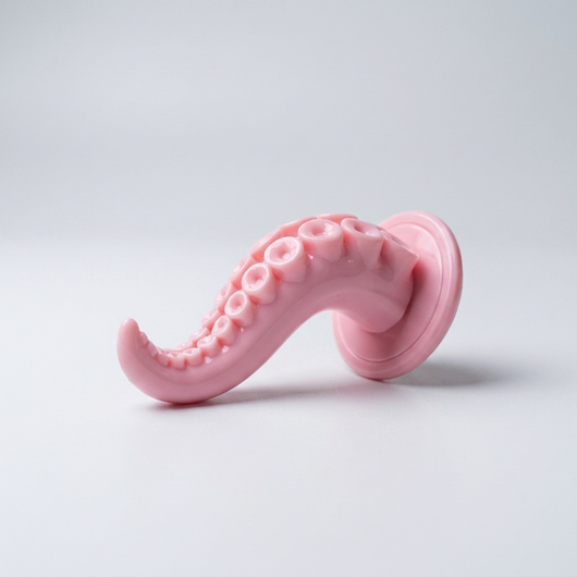 光沢のある桜ピンクのタコ足グリップ、クリーンな商品写真