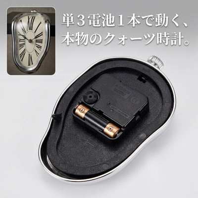 「単3電池1本で動く、本物のクォーツ時計。」背面のムーブメントと電池室