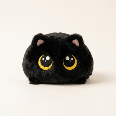 黒猫の香箱ねこを正面から撮った商品写真
