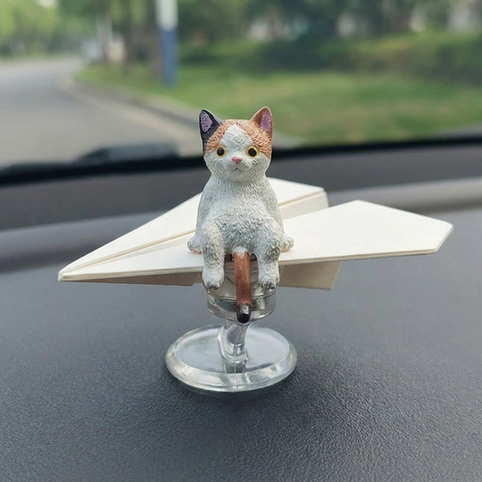 紙ヒコーキにまたがる三毛猫のダッシュボードオブジェ